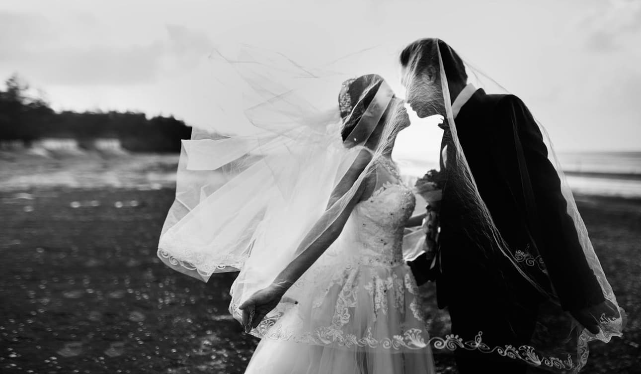 A tender kiss in black and white