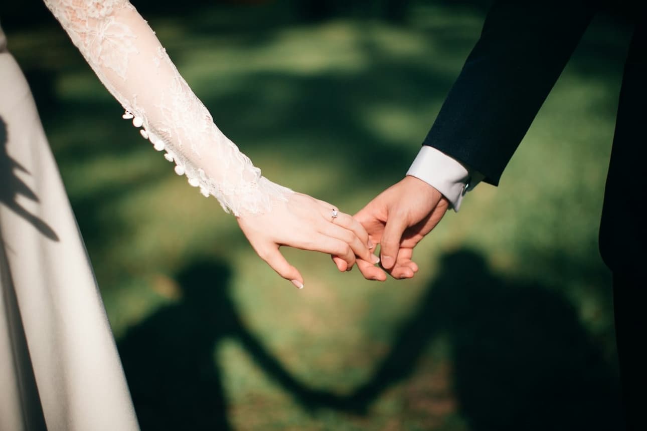 Hands held gently together